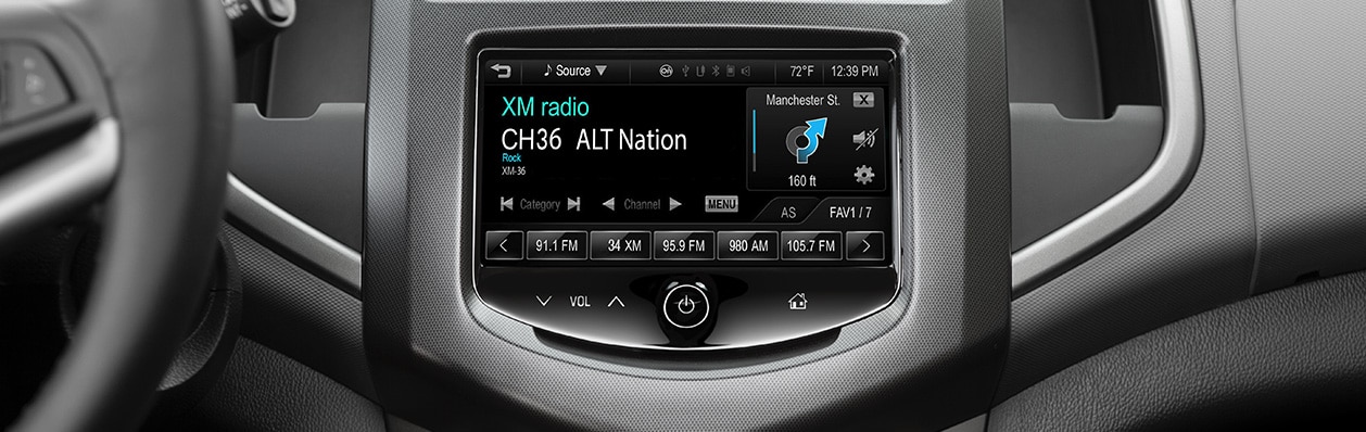 picture of a vehicle display screen with SiriusXM playing